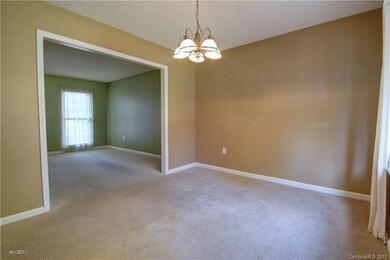 DINING ROOM: The dining room offers a large openin