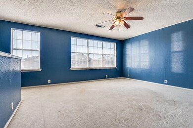 Unfurnished room featuring a healthy amount of sun