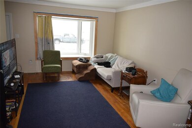 Living area with wood finished floors