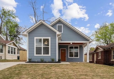 View of front of house with covered porch
