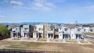 Front of modern townhome featuring stunning mounta
