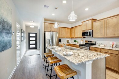 Photo shown is of a staged model home and should be used for illustration purposes only. Actual home features, finishes, color, upgrades and layout may vary. Furniture not included. 