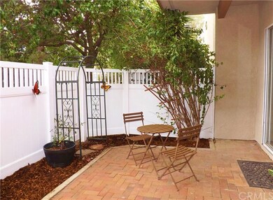 Another view of your private yard, with arbor whic
