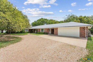 A fantastically deep double car garage with worksp