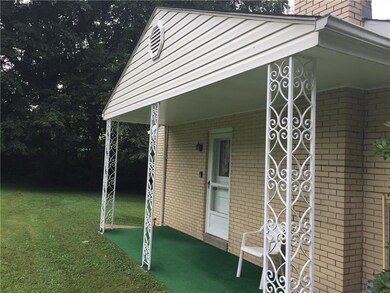 Relax on this side porch and let your stress melt 