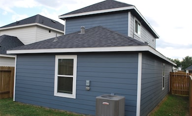 partially fenced backyard.