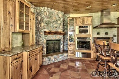 gas fireplace in kitchen with remote