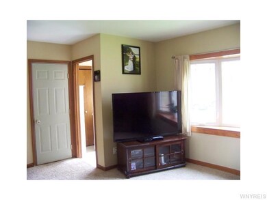 Foyer. The front entry has an upgraded front door 
