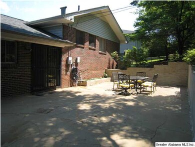 Large stamped concrete patio two steps from the ki