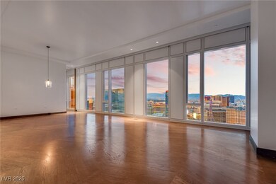 Unfurnished room with a view of city, expansive wi
