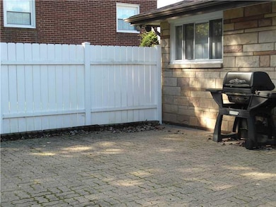 Patio/Deck. OMNI STONE PATIO WITH PRIVACY FENCE