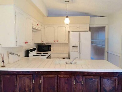 Kitchen. Refrigerator and range/oven included