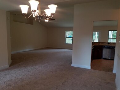 Formal Dining Room looking into the Great Room