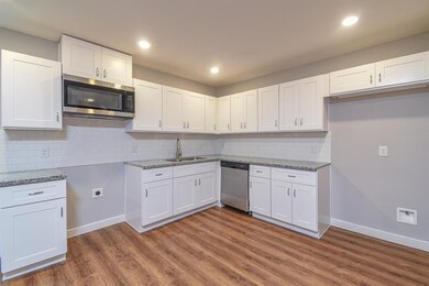 Kitchen and laundry room area