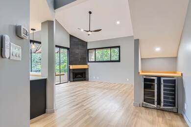 Unfurnished living room featuring light wood-styl