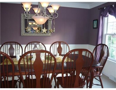 Dining Room. Beautiful decor; generous size; wainscot, chair rail and crown moldings.
