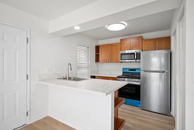 All-new kitchen cabinets, counters and appliances and a breakfast bar