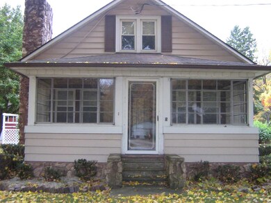 Large, enclosed front porch!