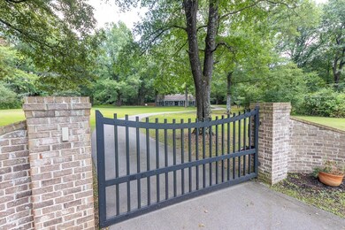 Home has a private, gated entry to the property wi