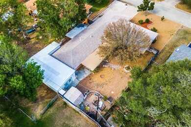 Massive workshop in backyard and mostly gravel bac