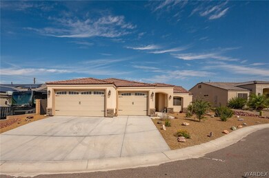 View of front of property featuring spacious 3 car
