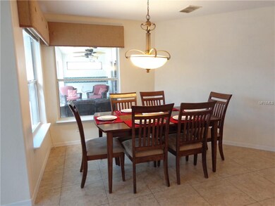 Dinette area with windows for view of pool and lan