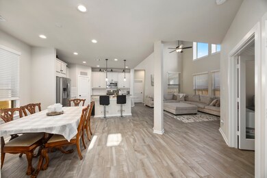Large open floorpan. Column separating the dining,