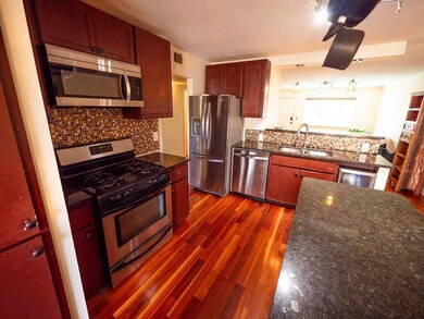 Kitchen featuring stainless steel appliances, dec