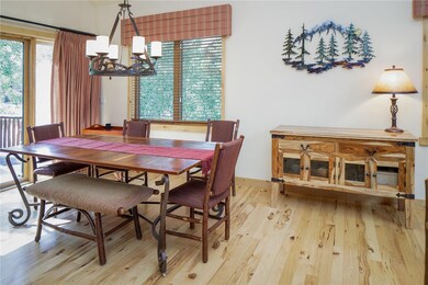 Beautiful wood floors and warm feel to this Dining