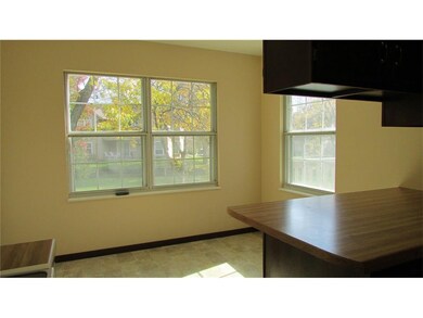 Kitchen dining area overlooks back yard.
