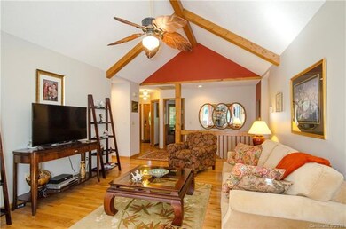 Exposed beams in great room emanate warmth