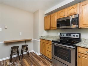Kitchen with wood laminate floors