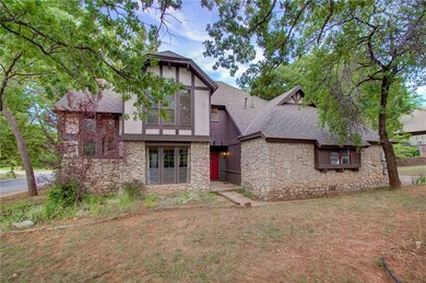 Beautiful English Tudor traditional with mature tr
