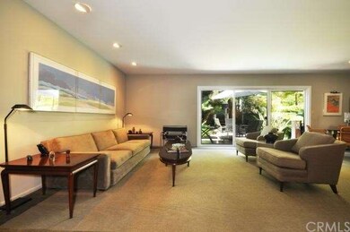 Open light and bright formal living room off of di