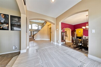 Entry. Movie Room to Left. Formal Dining to Right.