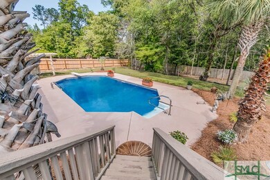 Step out of the eat in kitchen onto a deck featuri