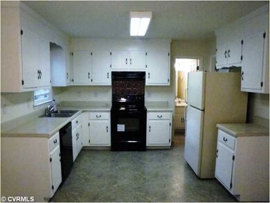 Kitchen - Brand new stove and range hood.  Refrige