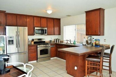 Sunny Kitchen Open to Dining Area