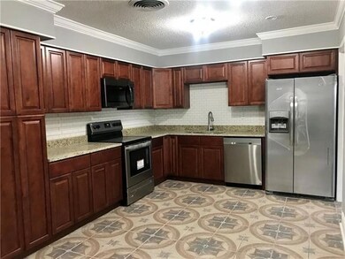Gorgeous kitchen with all stainless steel appliances