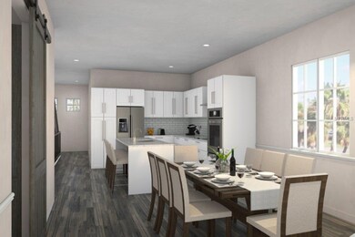 Please note that the oven in the cabinet wall will