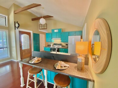Kitchen with breakfast bar and open concept.