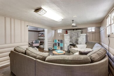Living room with dark hardwood / wood-style floori