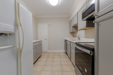 Kitchen with appliances with stainless steel finis