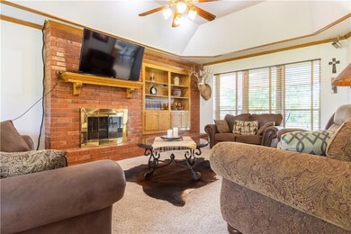 Living with gas log fireplace & new wood window tr