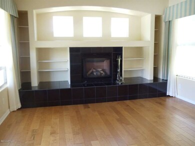 Great Room W/Tiled Fireplace,Draperies