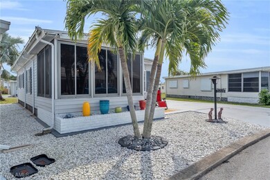 View of home's exterior featuring a sunroom