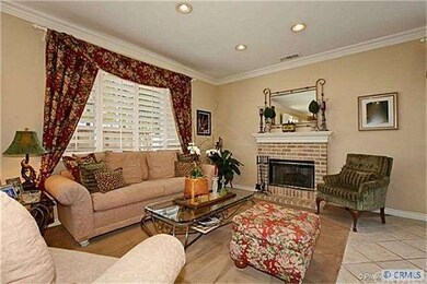 Another view of the family room with fireplace and