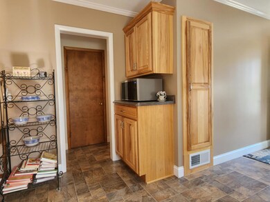 Lots of great hickory cabinets PLUS a custom pantry.