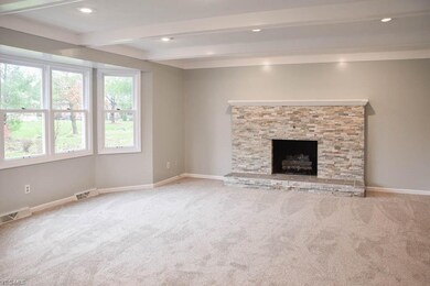 Family room with a fireplace.