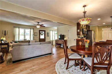 Open living area with all new hardwood flooring
